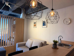 Elegante Loft Céntrico con Balcón